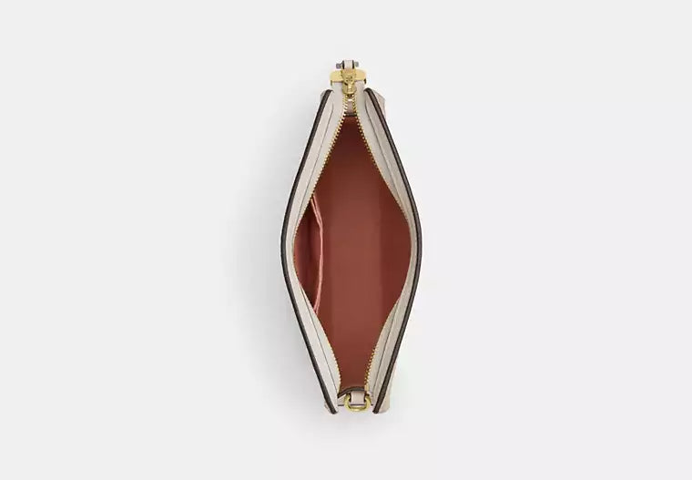 Slim Crossbody Bag In Signature Canvas With Floral Print