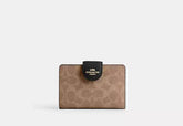 Coach Medium Corner Zip Wallet In Signature Canvas - Wallets | Shop From The Mirage