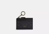 Coach Mini Skinny Id Case In Signature Canvas - Wallets | Shop From The Mirage