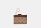 Coach Mini Skinny Id Case In Signature Canvas - Wallets | Shop From The Mirage