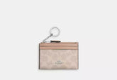 Coach Mini Skinny Id Case In Signature Canvas - Wallets | Shop From The Mirage