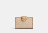 Coach Medium Corner Zip Wallet With Signature Canvas - Wallets | Shop From The Mirage