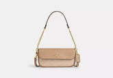 Coach Hailey Flap Bag With Signature Canvas - Bags | Shop From The Mirage