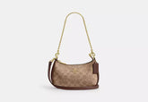 Coach Teri Mini Crossbody Bag In Signature Canvas - Bags | Shop From The Mirage