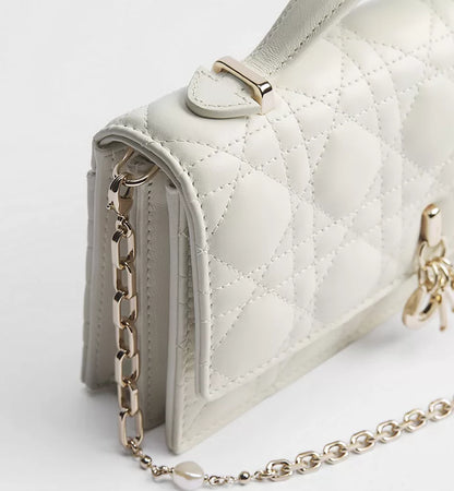 Latte-colored lambskin with Cannage motif