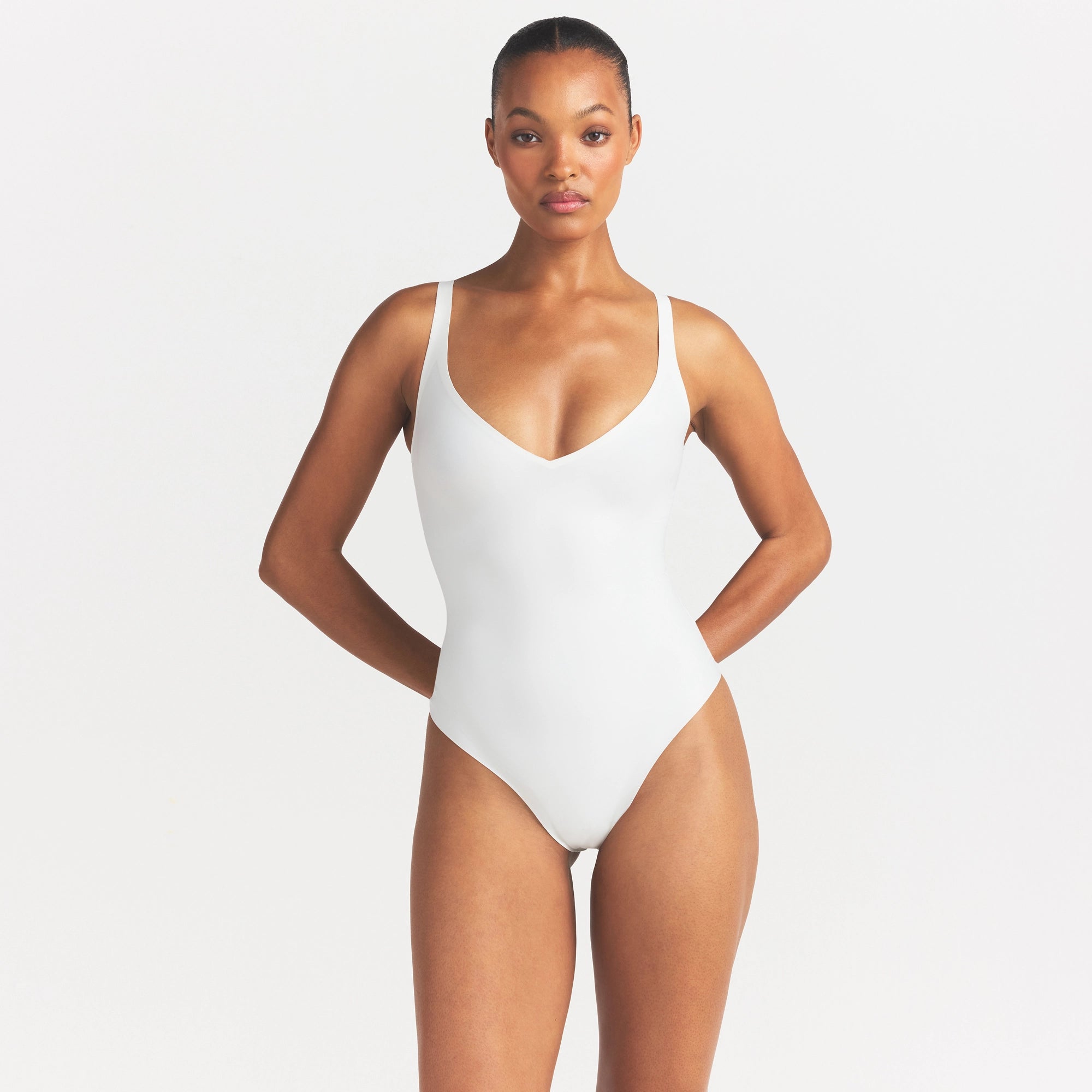 Skims Body Unlined Plunge Thong Bodysuit