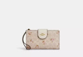 Coach Phone Wallet In Signature Canvas With Floral Print - Wallets | Shop From The Mirage