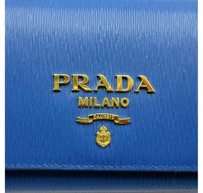 Vitello Move Cobalto Blue Leather Chain Crossbody Wallet Clutch