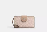 Coach Phone Wallet In Signature Canvas - Wallets | Shop From The Mirage