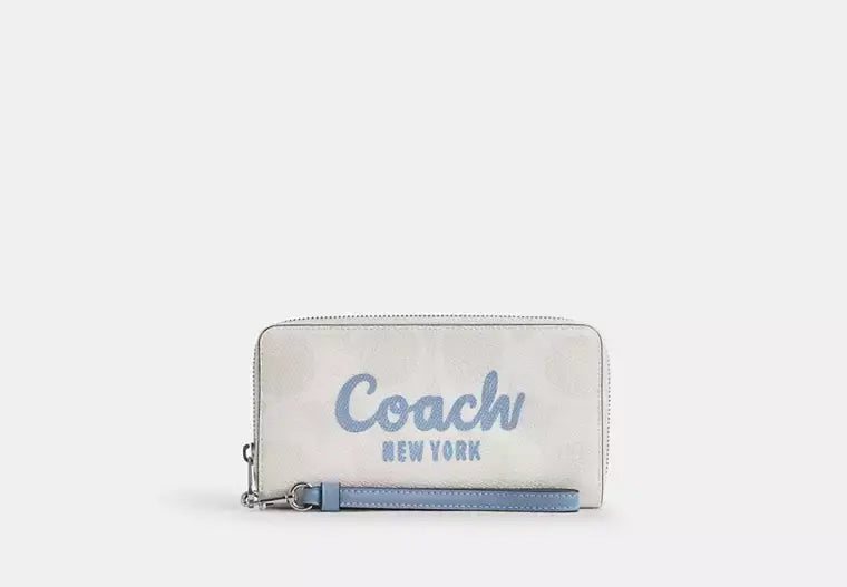 Coach Long Zip Around Wallet In Signature Canvas With Coach Graphic - Wallets | Shop From The Mirage