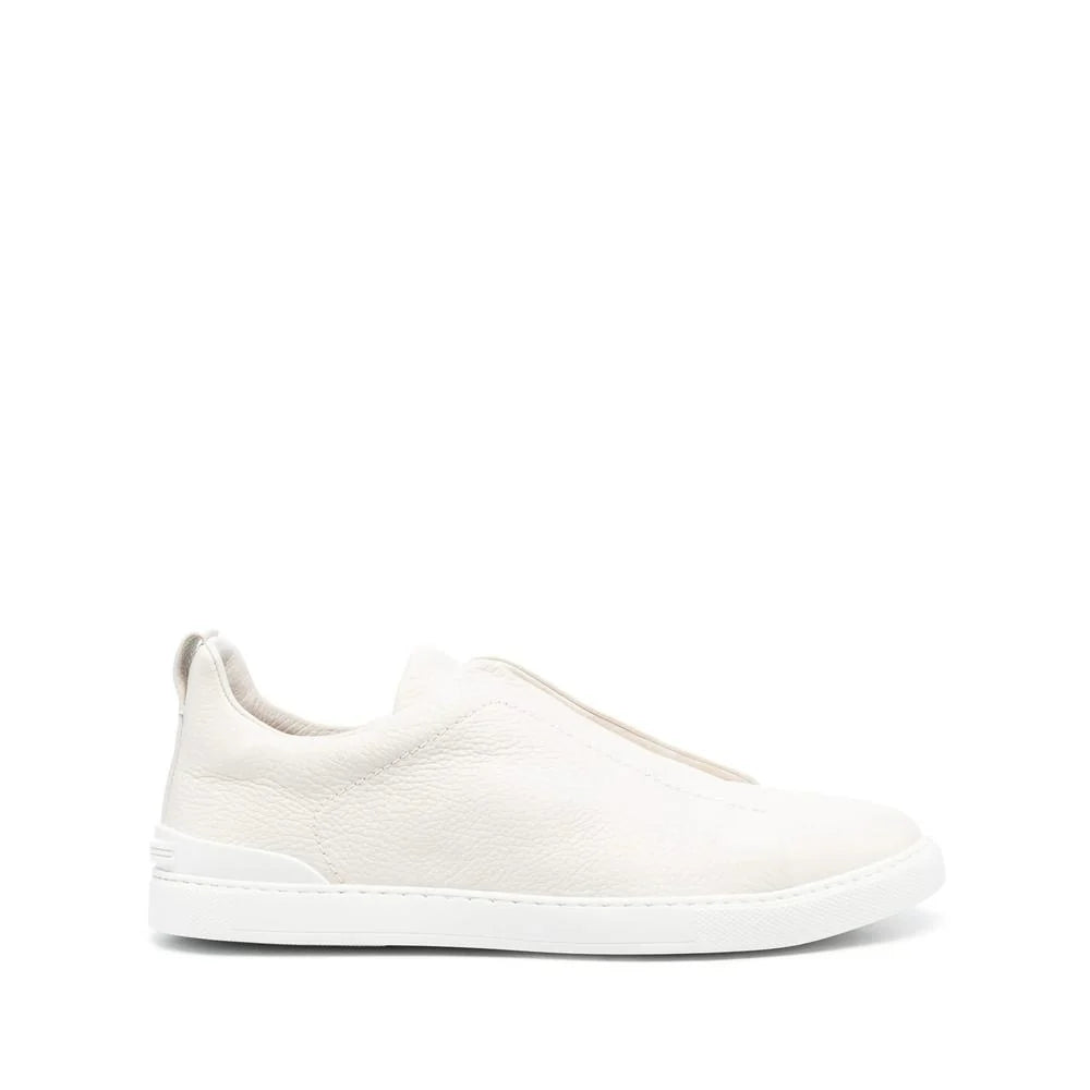 Zegna Men’s Off-White Grained Leather Slip-On Sneakers – Logo Debossed, Made in USA