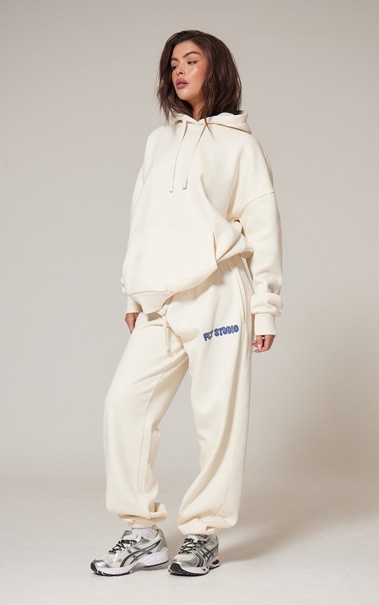 PRETTYLITTLETHING Sand Premium Studio Print Cuffed Joggers