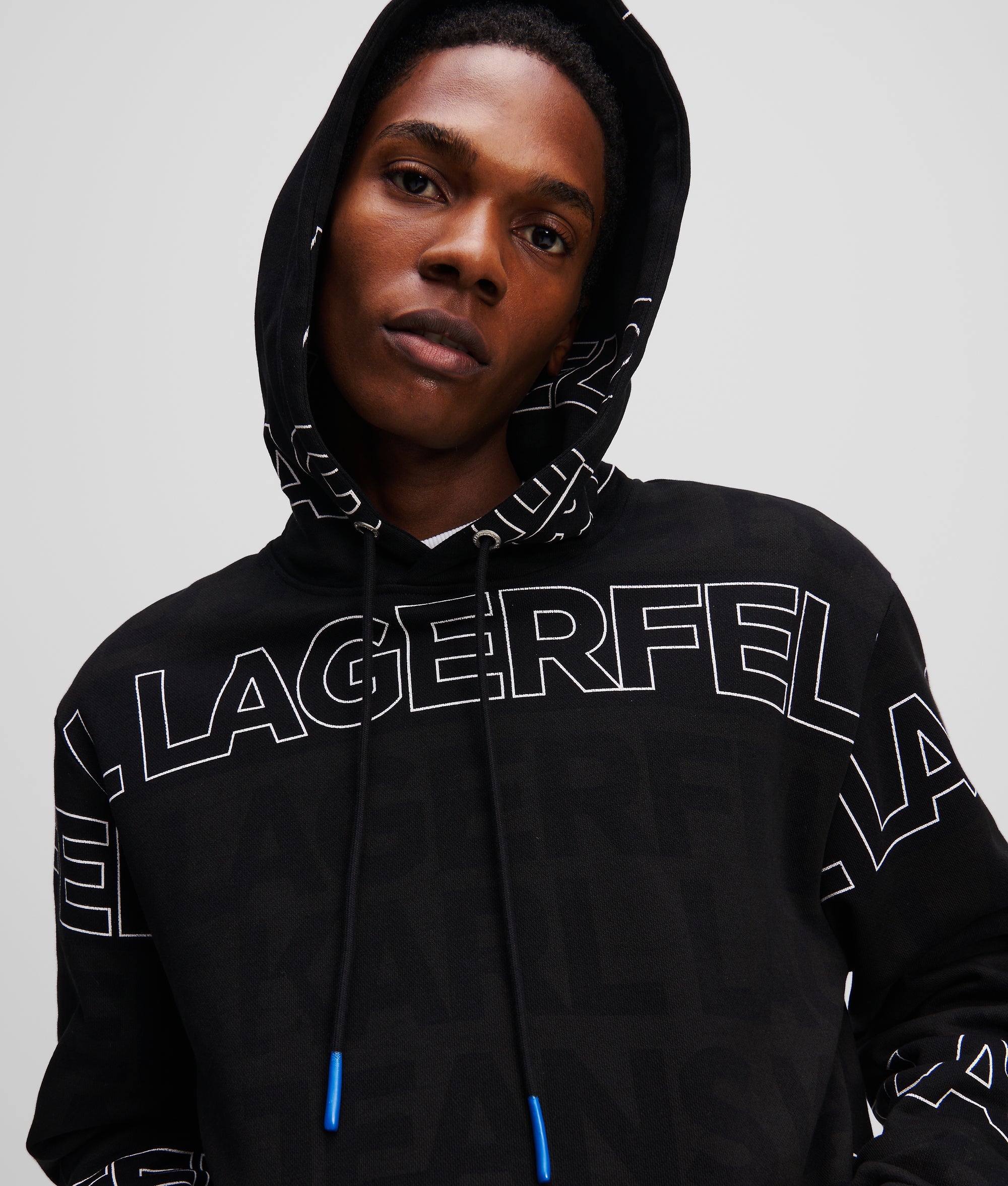 ALL-OVER LOGO HOODIE