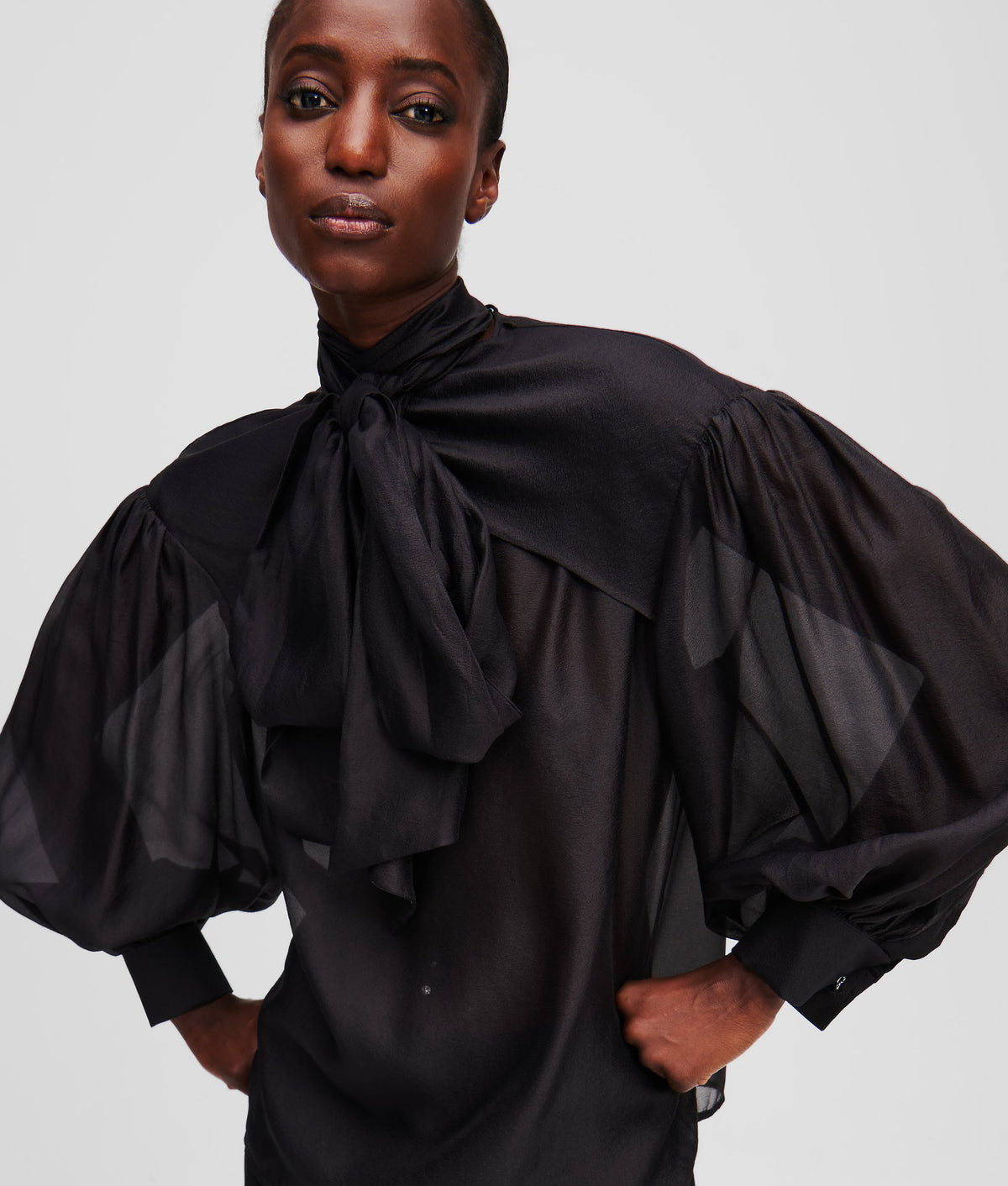 BOW-DETAIL METALLIC BLOUSE