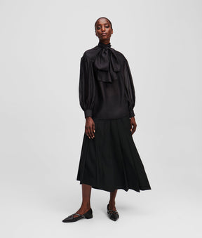 ASYMMETRIC PLEATED SKIRT