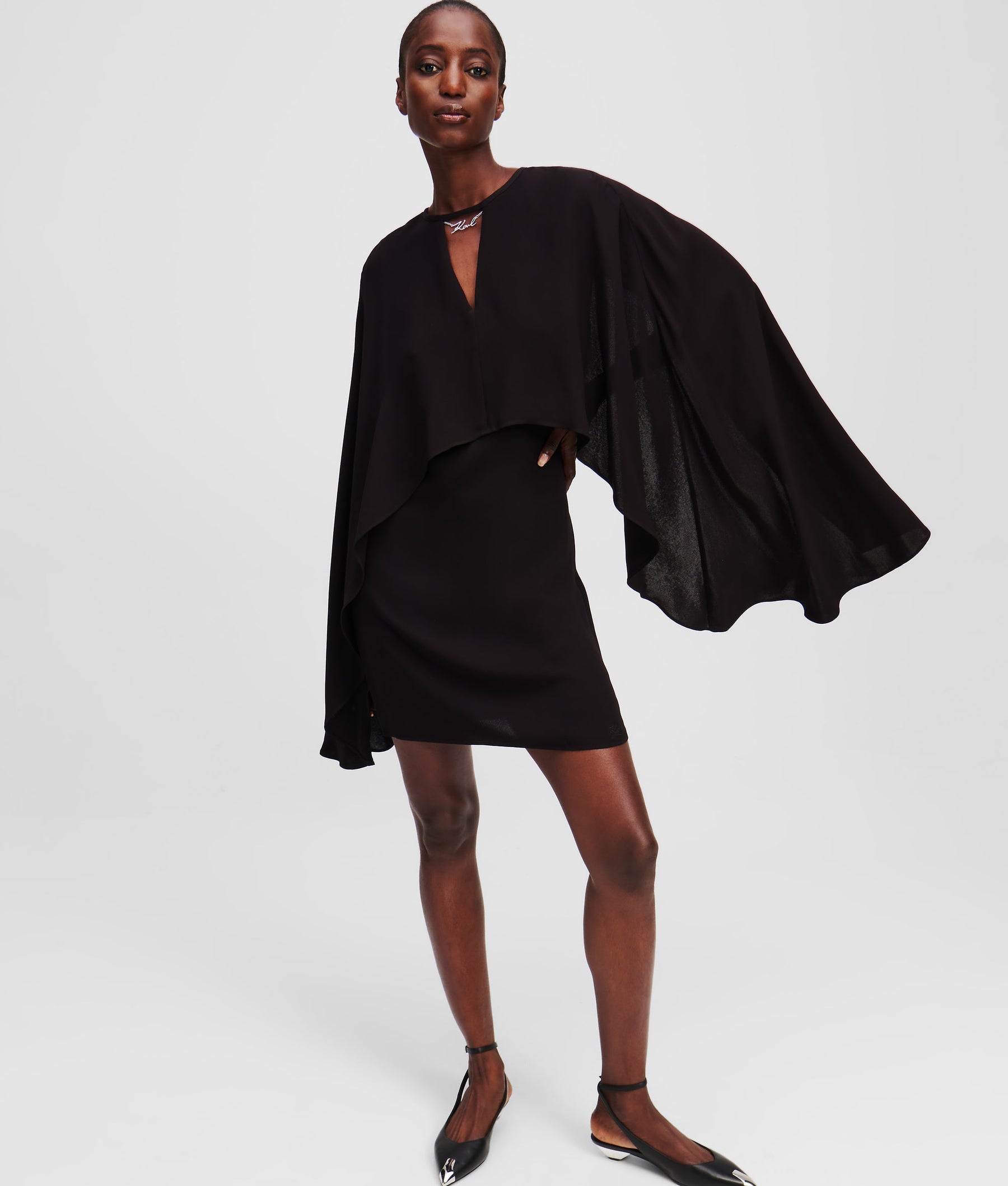 SHORT CAPE DRESS