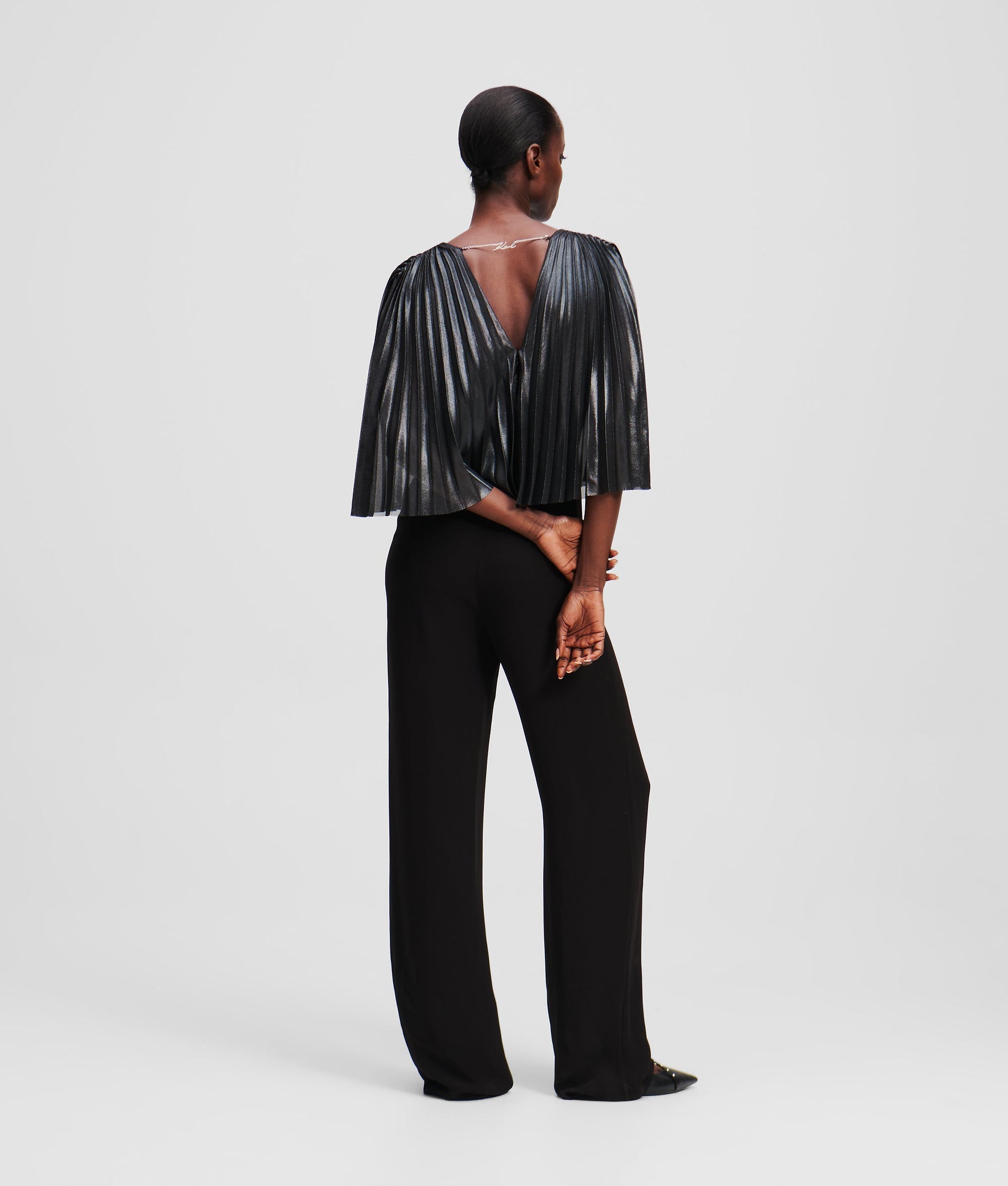 PLEATED CAPE JUMPSUIT