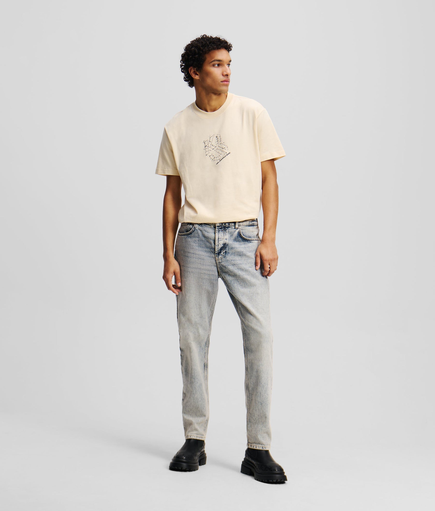 ACID WASH TAPERED JEANS