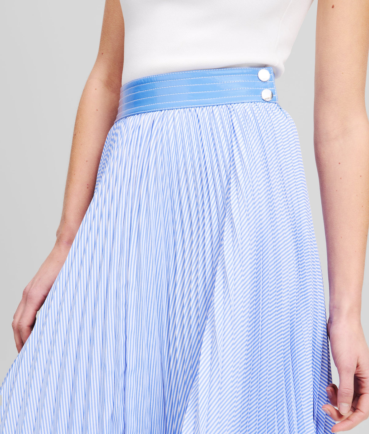 ASYMMETRIC PLEATED SKIRT