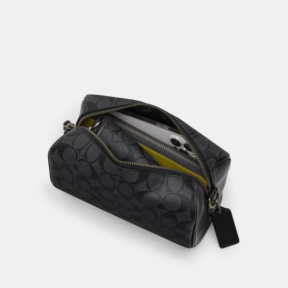 Axel Crossbody Bag In Signature Canvas