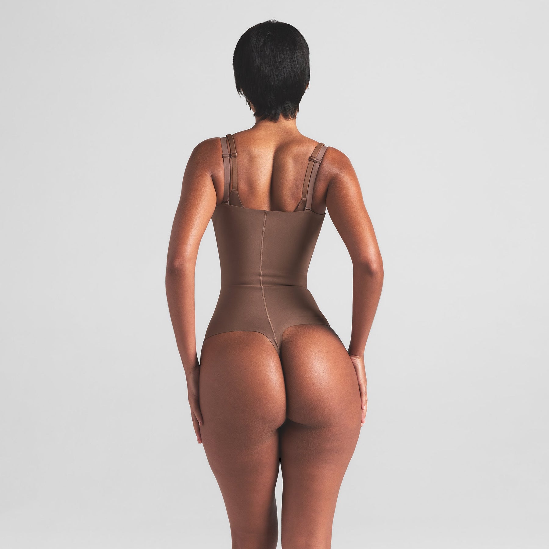 SKIMS BODY CORE SCULPT OPEN BUST THONG BODYSUIT | JASPER
