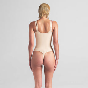 SKIMS BODY CORE SCULPT OPEN BUST THONG BODYSUIT | SAND