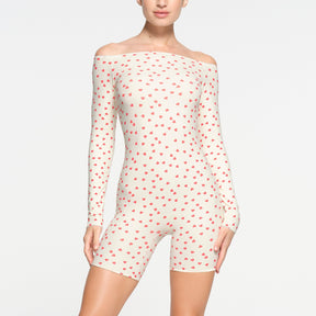 FITS EVERYBODY PICOT OFF THE SHOULDER ONESIE | RUBY HEART PRINT