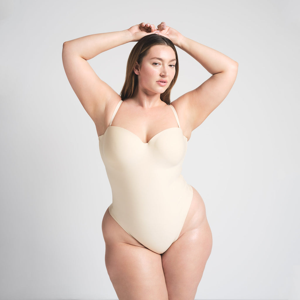 SKIMS BODY UNDERWIRE THONG BODYSUIT | SAND