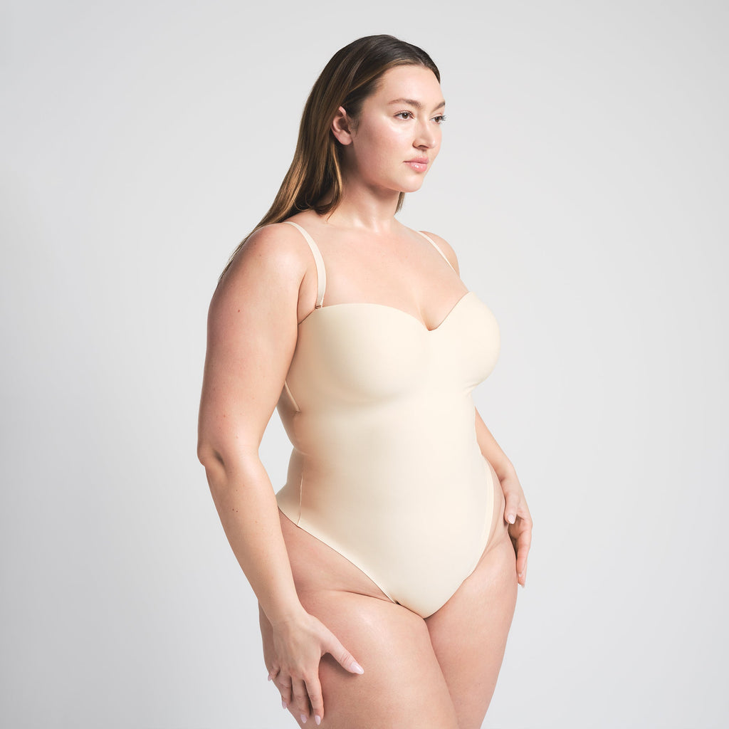 SKIMS BODY UNDERWIRE THONG BODYSUIT | SAND