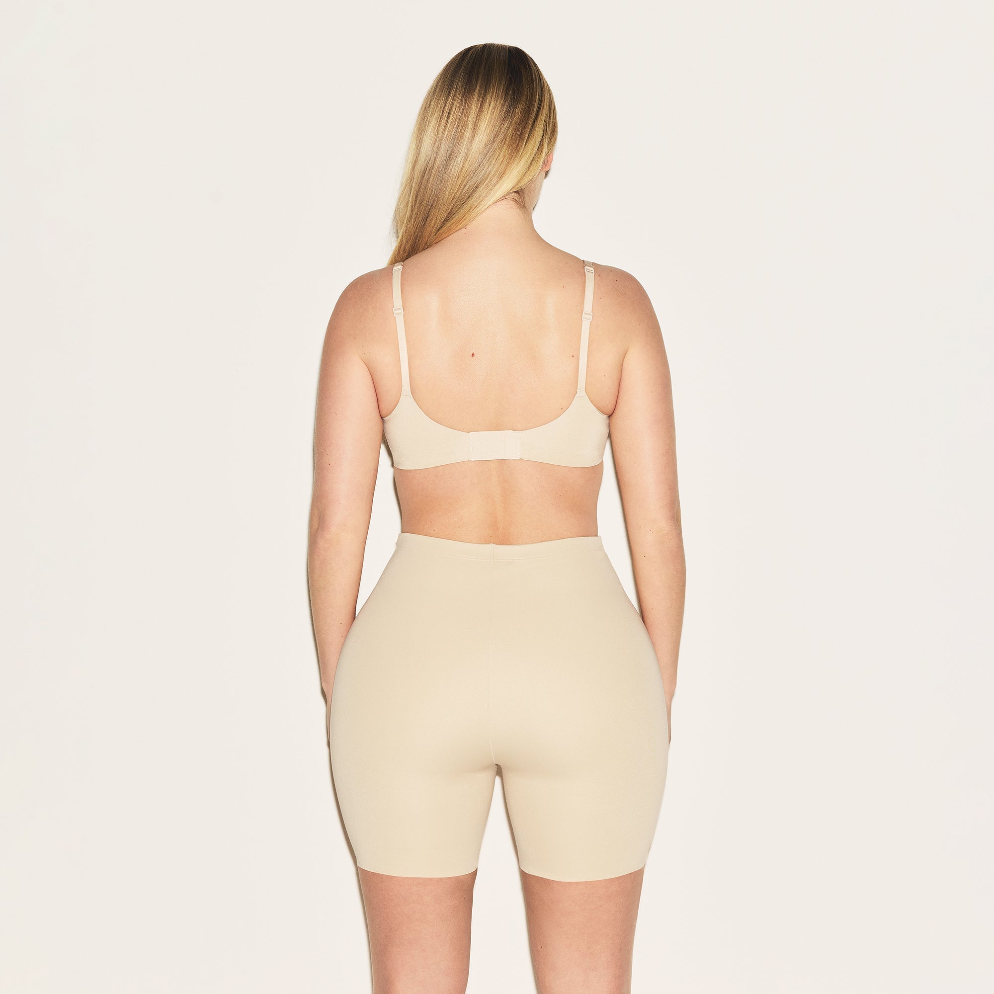 SKIMS BODY HIP ENHANCING PADDED SHORT | SAND