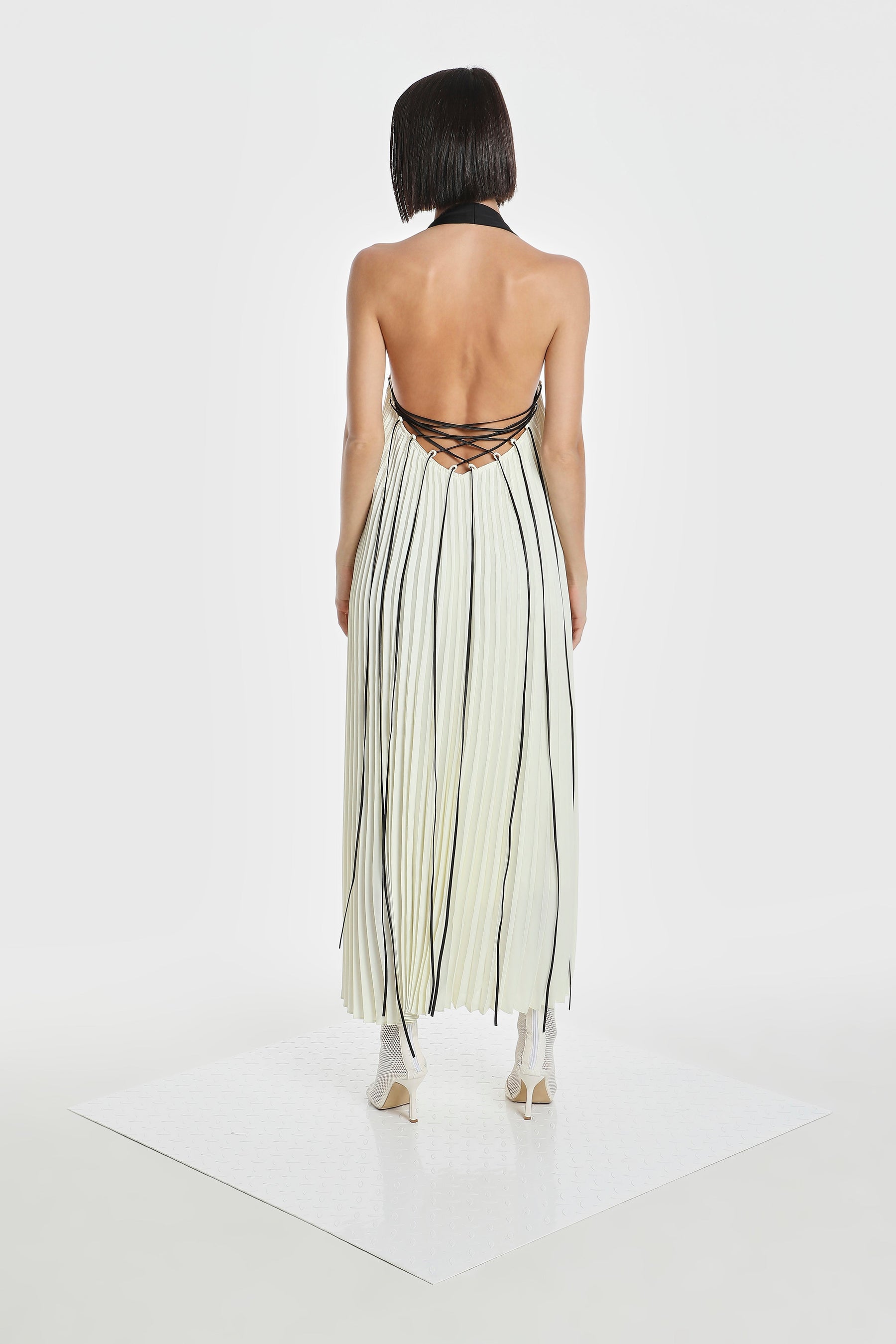 HALTER ACCENT PLEATED DRESS