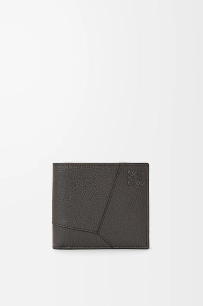 Puzzle bifold wallet in supple grained calfskin