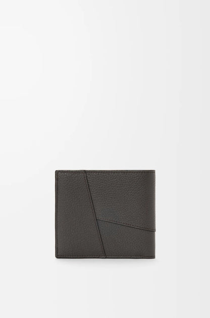 Puzzle bifold wallet in supple grained calfskin