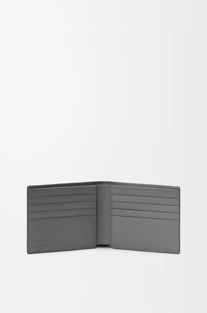 Puzzle bifold wallet in supple grained calfskin