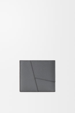 Puzzle bifold wallet in supple grained calfskin
