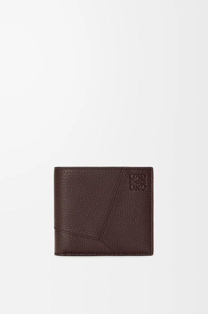 Puzzle bifold wallet in supple grained calfskin