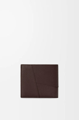 Puzzle bifold wallet in supple grained calfskin
