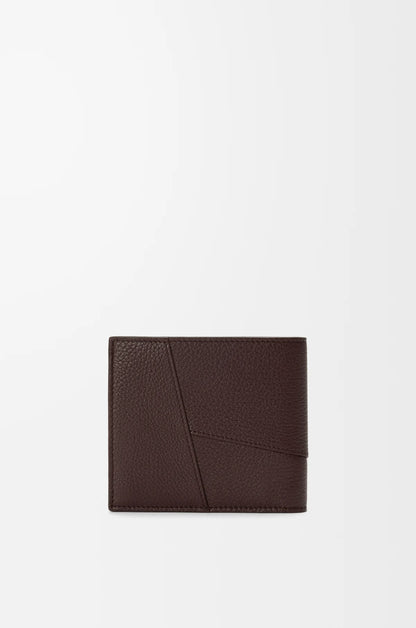 Puzzle bifold wallet in supple grained calfskin