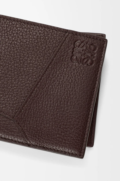 Puzzle bifold wallet in supple grained calfskin