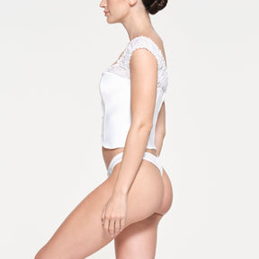 SKIMS ROMANCE SATIN PLUNGE CORSET | SNOW