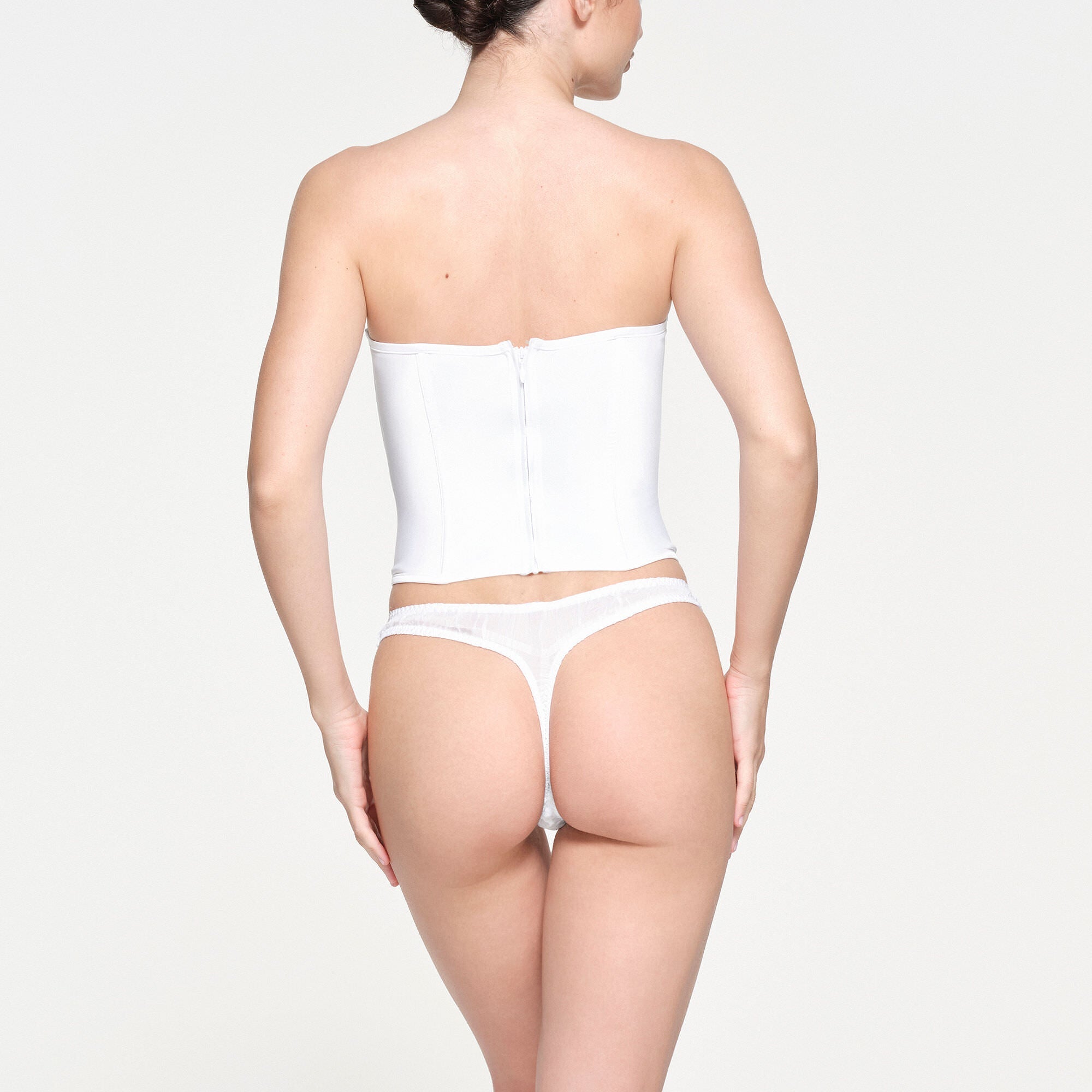 SKIMS ROMANCE SATIN PLUNGE CORSET | SNOW
