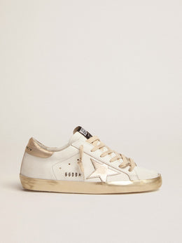 Women's Super-Star with gold sparkle foxing and metal stud lettering