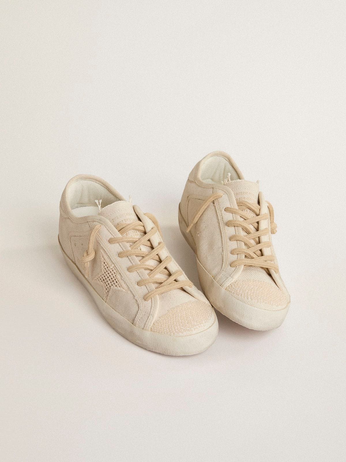 Super-Star in pearl-colored canvas with a tone-on-tone mesh effect star