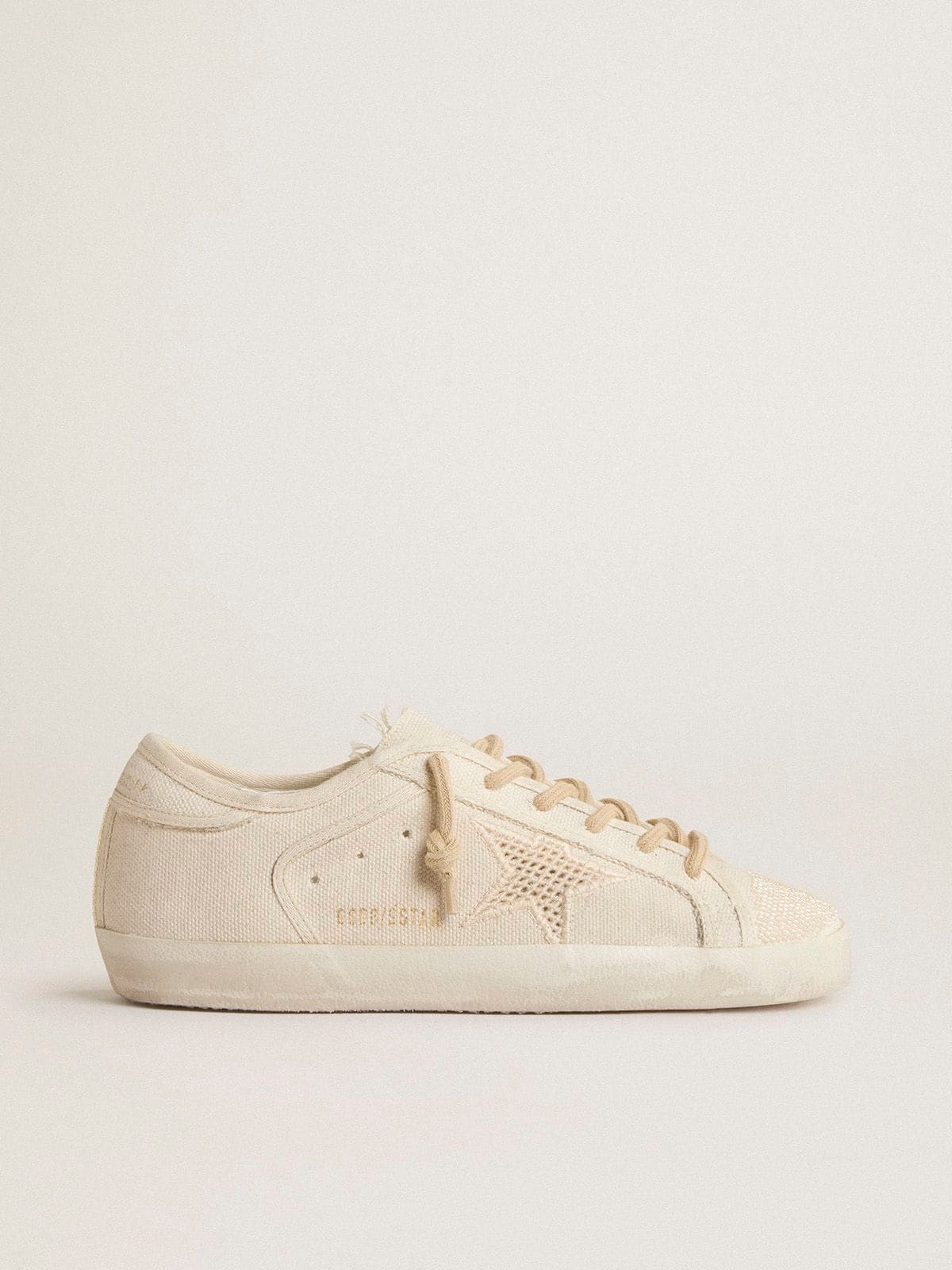 Super-Star in pearl-colored canvas with a tone-on-tone mesh effect star