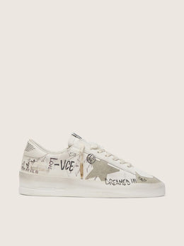 Stardan with beige suede star and toe and all-over lettering and patterns