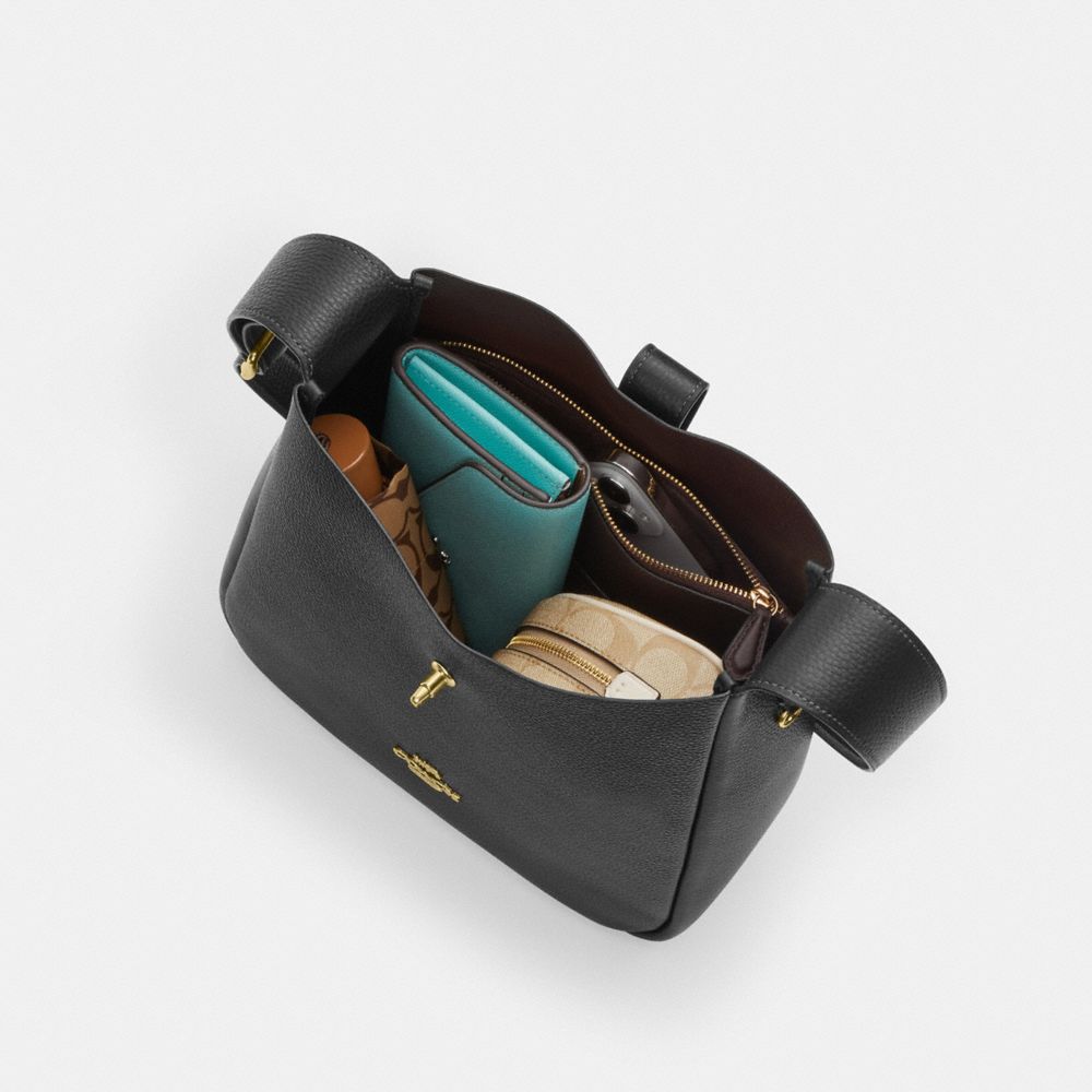 Hadley Convertible Crossbody Bag With Cow Print And Tassel