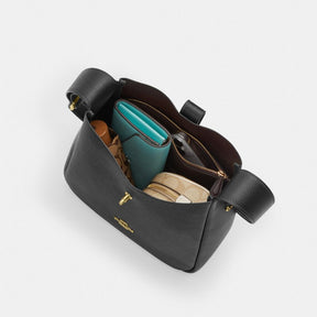 Hadley Convertible Crossbody Bag With Cow Print And Tassel