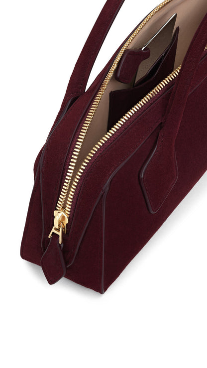 LE TECKEL CLUTCH IN SUEDE