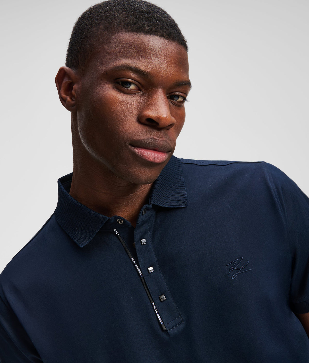 PRESS BUTTON POLO SHIRT