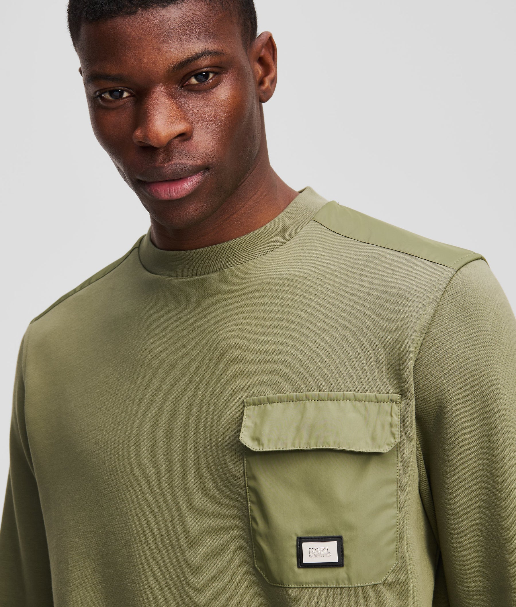 CHEST POCKET SWEATSHIRT